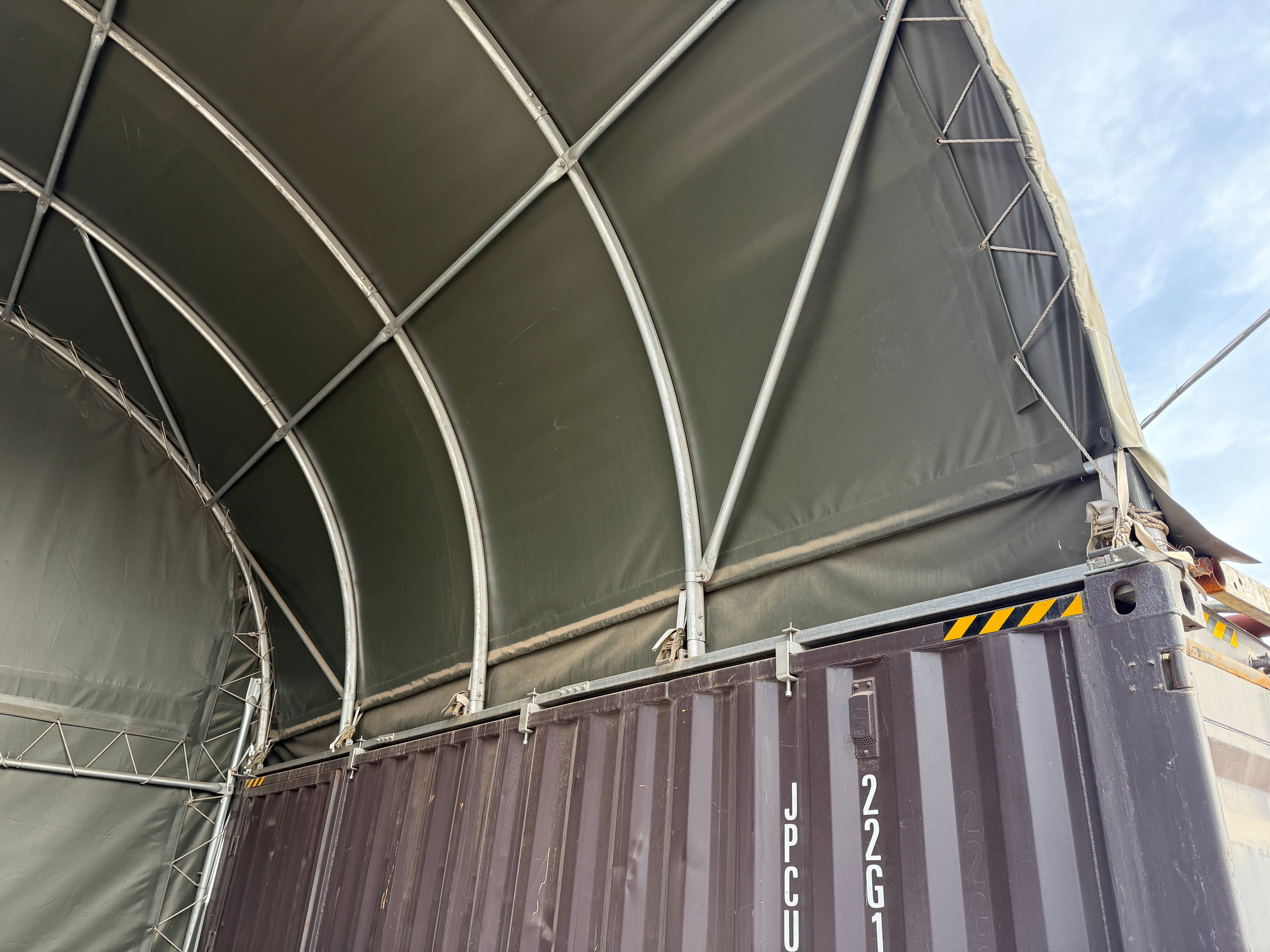 Clamping Attachment System for Container Canopies